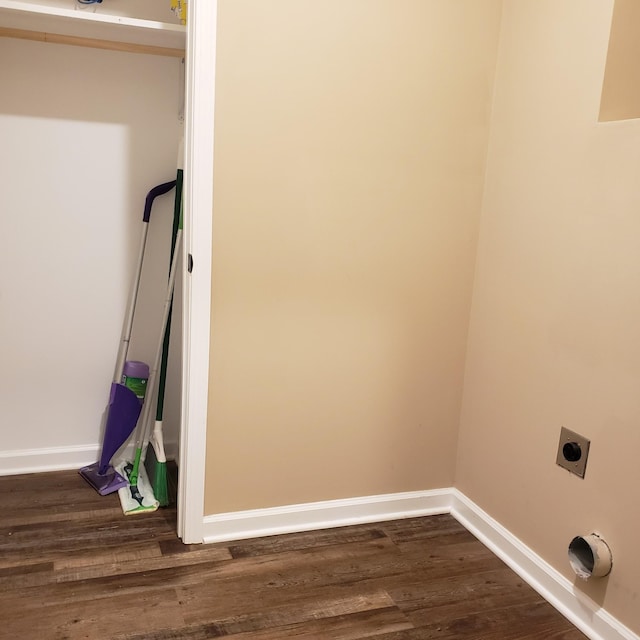 washroom featuring laundry area, dark wood-type flooring, baseboards, and hookup for an electric dryer