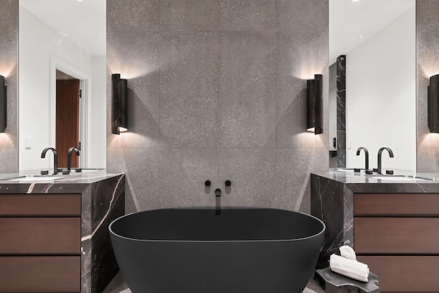 1616 W End Ave Unit 3202, Nashville, TN 37203 - bathroom featuring a soaking tub, two vanities, and a sink