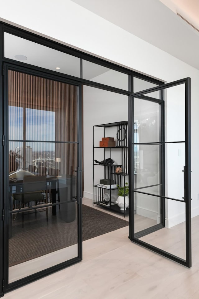 1616 W End Ave Unit 3202, Nashville, TN 37203 - doorway with wood finished floors and baseboards