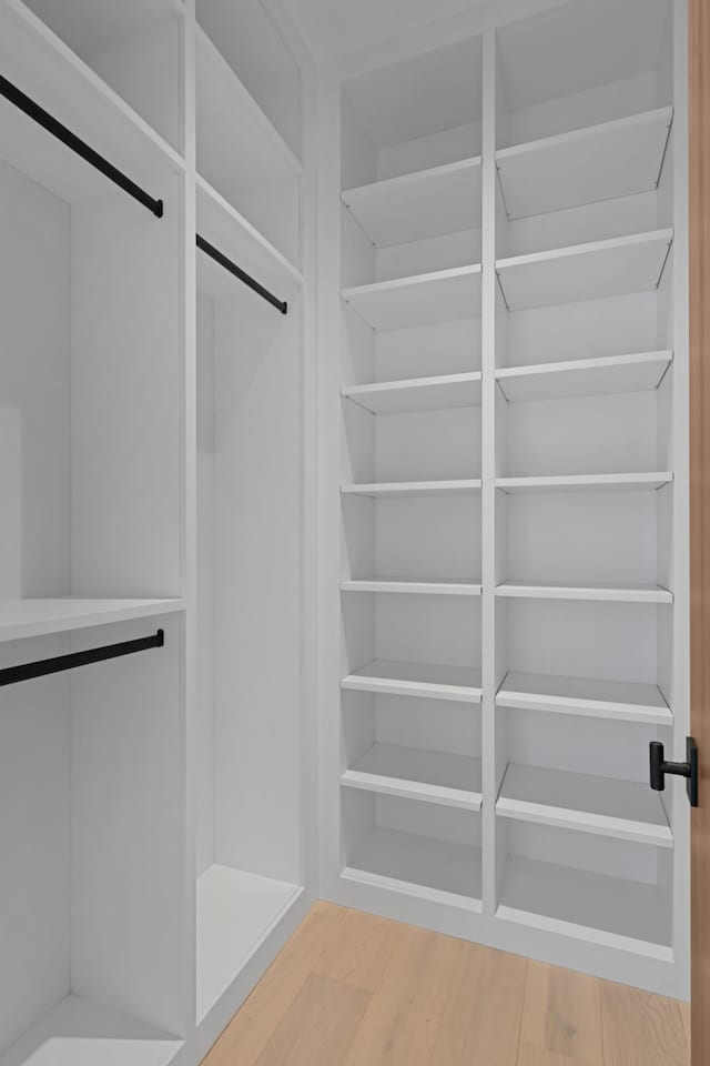 1616 W End Ave Unit 3202, Nashville, TN 37203 - walk in closet featuring wood finished floors