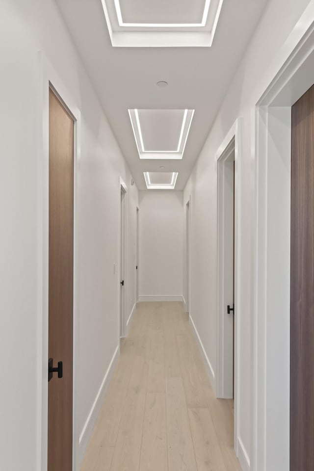1616 W End Ave Unit 3202, Nashville, TN 37203 - hallway featuring baseboards and light wood-type flooring