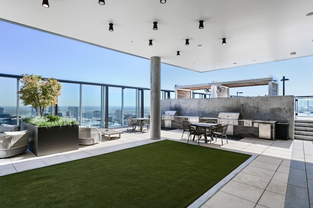 1616 W End Ave Unit 3202, Nashville, TN 37203 - view of patio / terrace featuring an outdoor kitchen, area for grilling, and fence