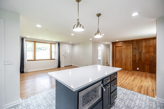 411 Rosehill Ct, Goodlettsville, TN 37072 - kitchen with light countertops, stainless steel microwave, open floor plan, and recessed lighting