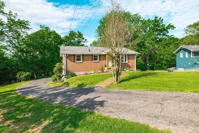 411 Rosehill Ct, Goodlettsville, TN 37072 - ranch-style house featuring a front yard and brick siding