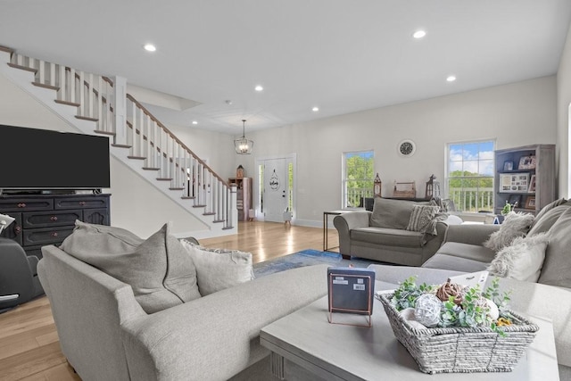 531 Wilson Hollow Rd, Dickson, TN 37055 - living room featuring stairway, light wood-style flooring, and recessed lighting