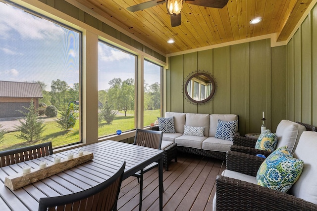 sunroom with an outdoor hangout area and ceiling fan