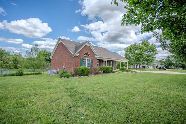 1876 Fall River Rd, Lawrenceburg, TN 38464 - view of front facade with brick siding and a shingled roof