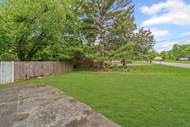 view of yard with fence