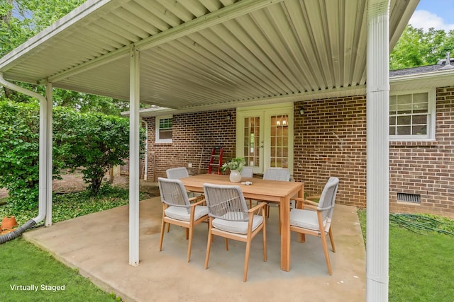 view of patio / terrace featuring outdoor dining area and french doors
