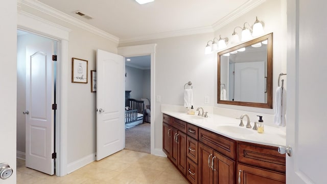 bathroom with double vanity, visible vents, ornamental molding, and a sink