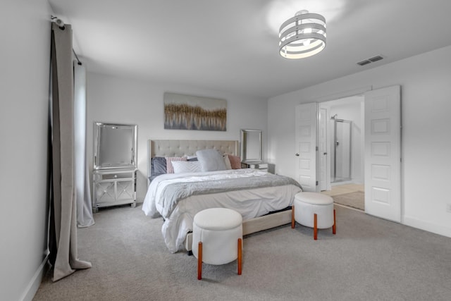 carpeted bedroom featuring baseboards