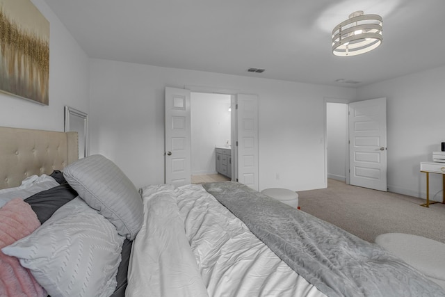carpeted bedroom with baseboards