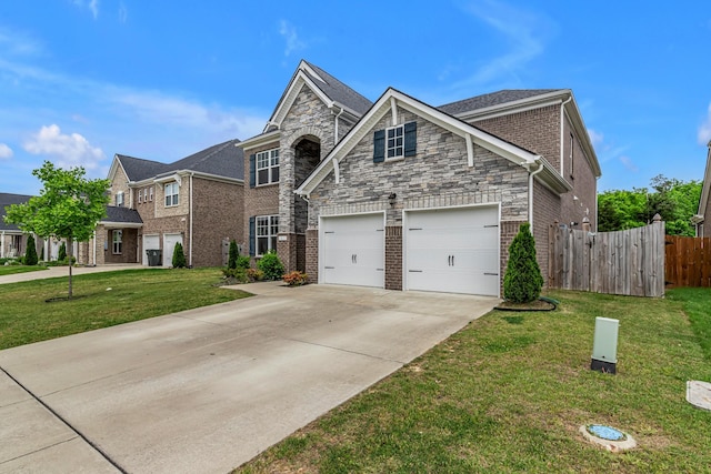 traditional home with driveway, brick siding, and stone siding