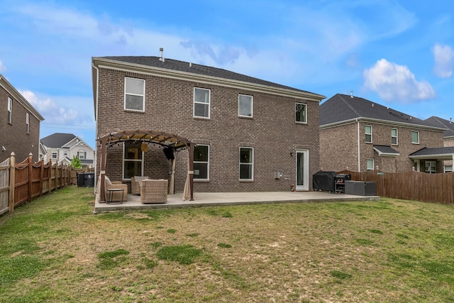 rear view of property featuring a pergola, a patio area, brick siding, and outdoor lounge area