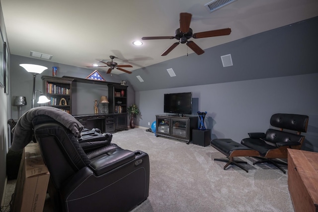 carpeted living room with ceiling fan, lofted ceiling, and baseboards