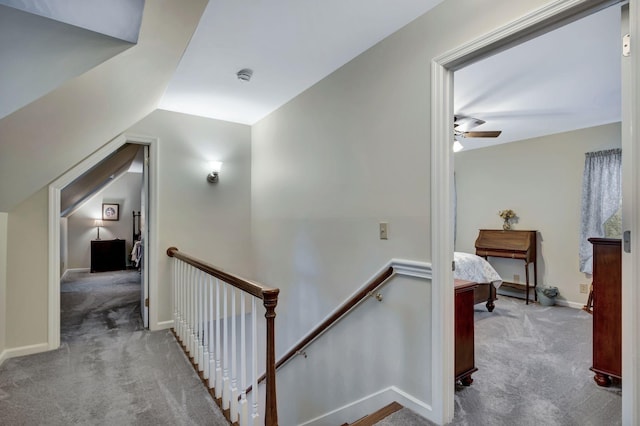 121 Grassland Dr, Gallatin, TN 37066 - stairway featuring carpet flooring, lofted ceiling, a ceiling fan, and baseboards