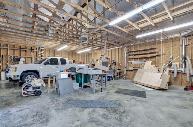 121 Grassland Dr, Gallatin, TN 37066 - garage featuring a workshop area