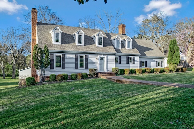 121 Grassland Dr, Gallatin, TN 37066 - new england style home with a chimney and a front lawn