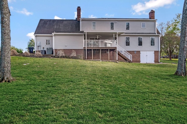 121 Grassland Dr, Gallatin, TN 37066 - rear view of property with a chimney, stairs, a ceiling fan, and a yard