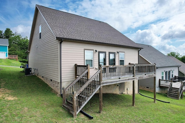 back of property featuring stairway, a deck, crawl space, a yard, and central AC