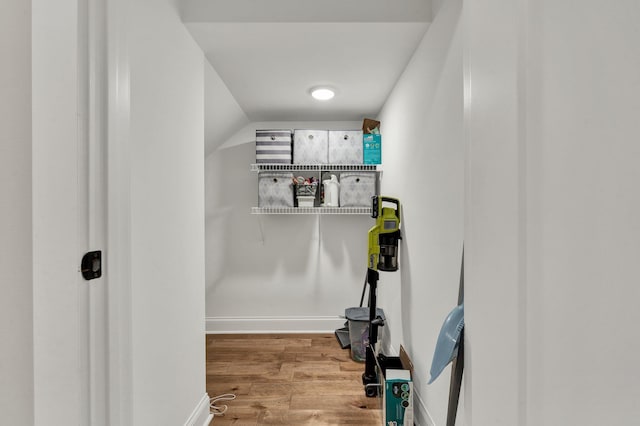 spacious closet with wood finished floors
