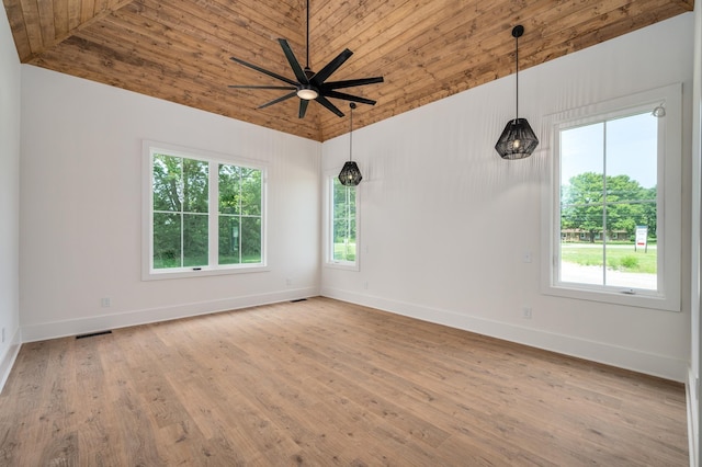 unfurnished room with ceiling fan, wood finished floors, wood ceiling, vaulted ceiling, and baseboards