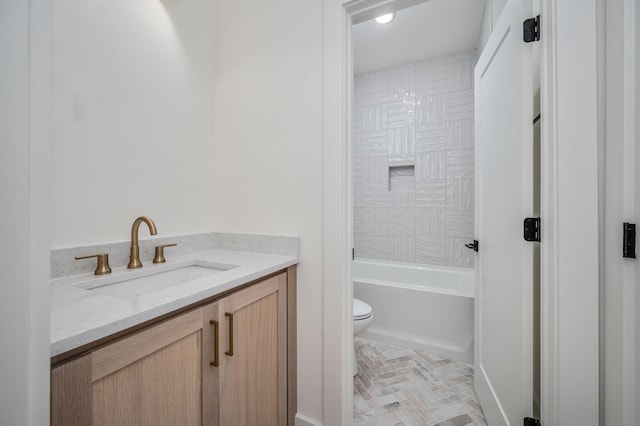 full bath with toilet, vanity, and shower / bathtub combination