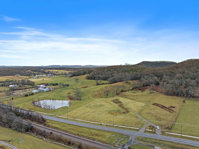 aerial overview of property's location featuring a nearby body of water and rural landscape