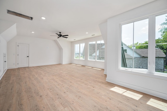 bonus room featuring light wood-type flooring, ceiling fan, lofted ceiling, baseboards, and recessed lighting