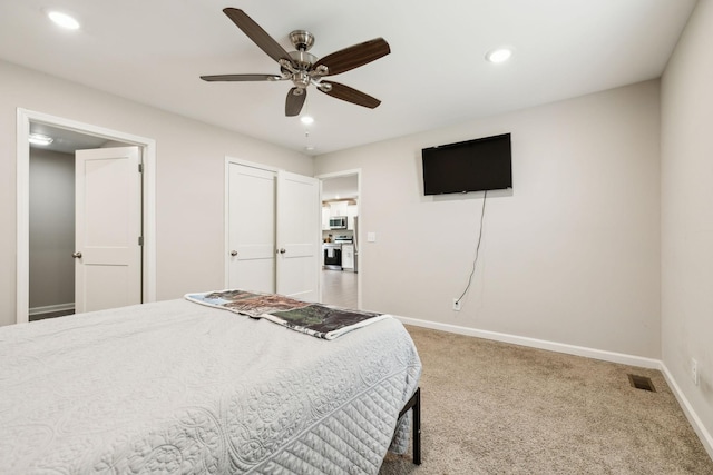 carpeted bedroom with recessed lighting, baseboards, and a ceiling fan