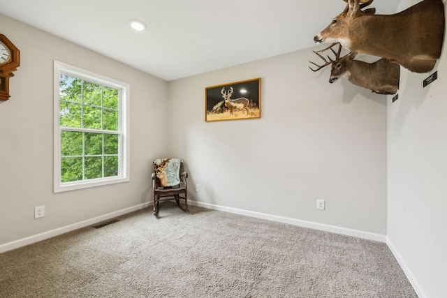 sitting room featuring carpet floors, baseboards, and recessed lighting