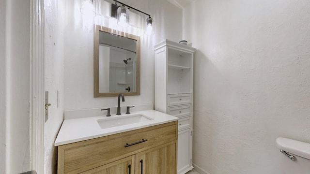 5900 New Hope Ct, Hermitage, TN 37076 - bathroom featuring toilet, vanity, and a shower