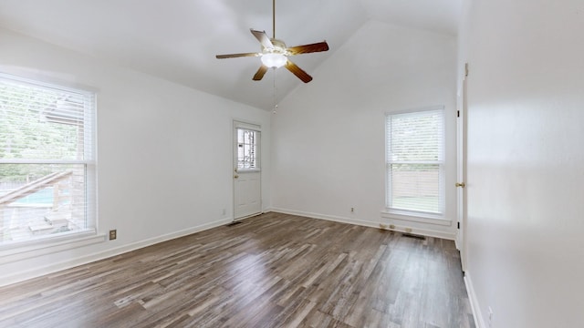 5900 New Hope Ct, Hermitage, TN 37076 - empty room with wood finished floors, ceiling fan, baseboards, and high vaulted ceiling