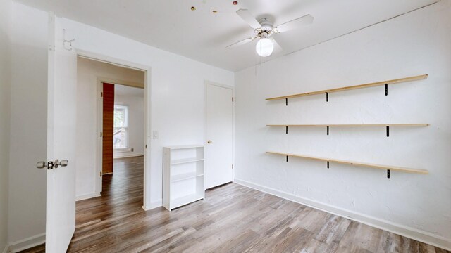 5900 New Hope Ct, Hermitage, TN 37076 - spare room featuring a ceiling fan, wood finished floors, and baseboards