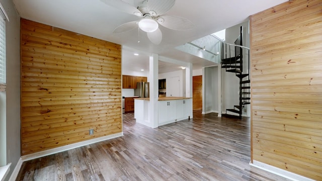 5900 New Hope Ct, Hermitage, TN 37076 - unfurnished living room featuring ceiling fan, stairway, wood finished floors, and baseboards