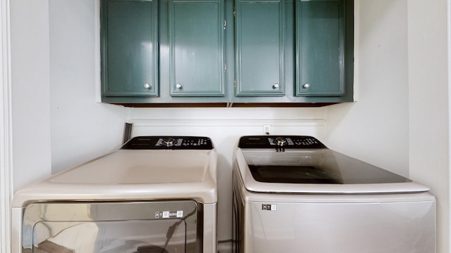 5900 New Hope Ct, Hermitage, TN 37076 - clothes washing area featuring cabinet space and washing machine and dryer
