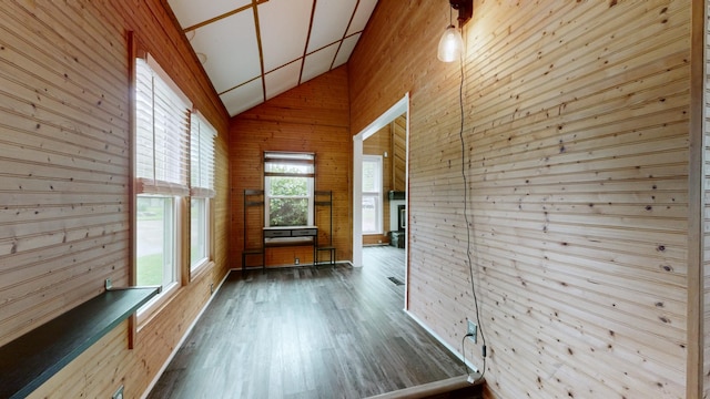 5900 New Hope Ct, Hermitage, TN 37076 - hall with wooden walls, wood finished floors, and high vaulted ceiling