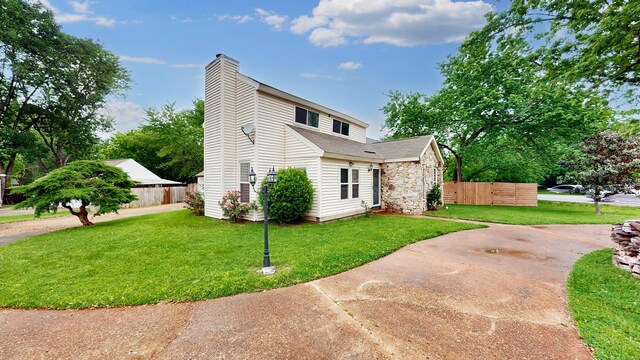 5900 New Hope Ct, Hermitage, TN 37076 - view of side of property featuring a chimney and roof with shingles