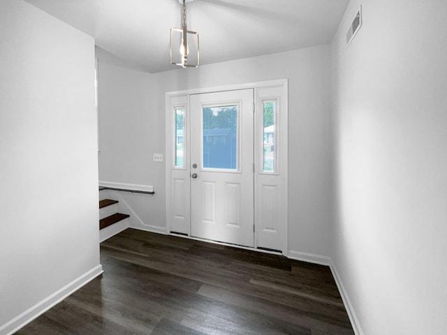 entrance foyer with wood finished floors and baseboards