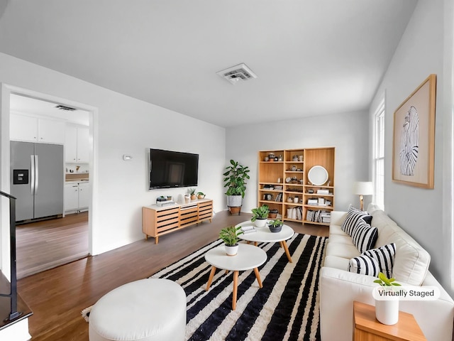 living area with wood finished floors