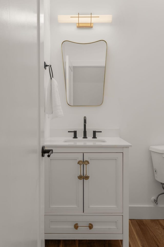 5615 Tennessee Ave Unit A, Nashville, TN 37209 - bathroom with vanity, wood finished floors, baseboards, and toilet