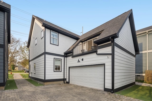 5615 Tennessee Ave Unit A, Nashville, TN 37209 - back of house with a balcony, a garage, and decorative driveway