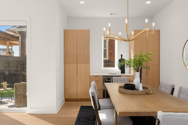 1400 Arthur Ave Unit 3, Nashville, TN 37208 - dining room with light wood-style flooring, a chandelier, recessed lighting, and baseboards