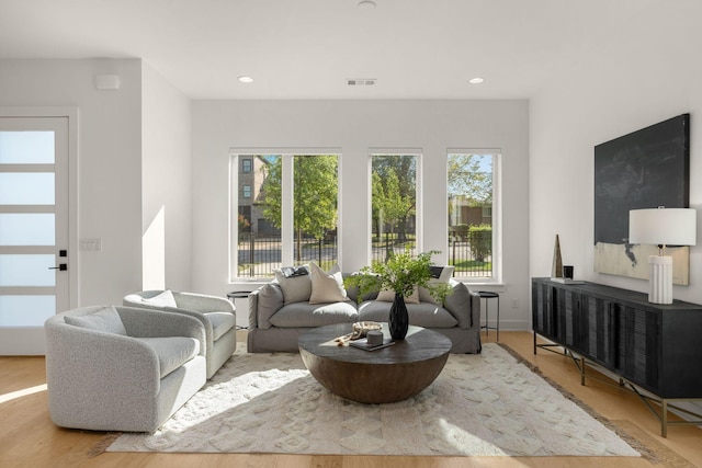 1400 Arthur Ave Unit 3, Nashville, TN 37208 - living room with plenty of natural light, wood finished floors, and recessed lighting