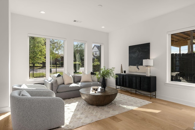 1400 Arthur Ave Unit 3, Nashville, TN 37208 - living area with wood finished floors, baseboards, and recessed lighting