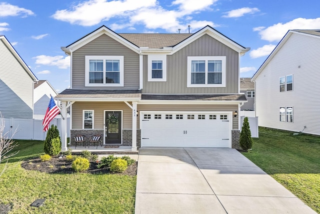 view of front of property featuring a porch, board and batten siding, an attached garage, driveway, and a shingled roof