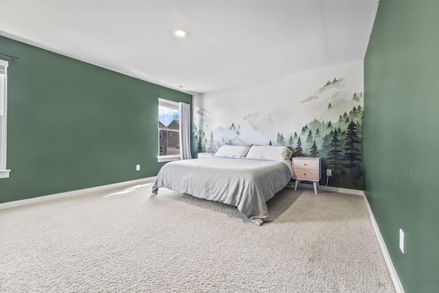 carpeted bedroom with baseboards