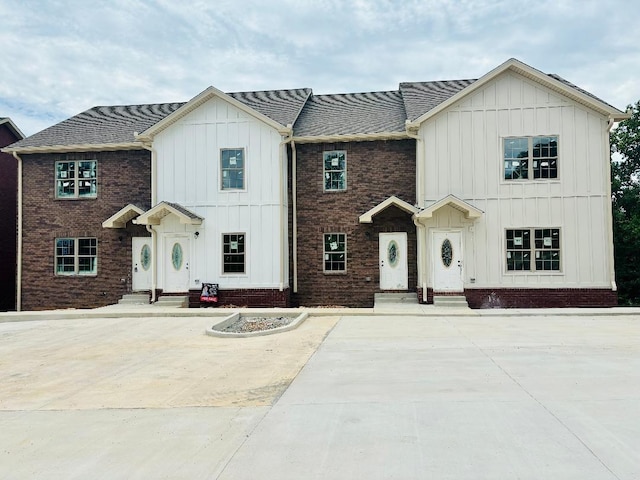 500 Peachers Mill Rd Unit C2, Clarksville, TN 37042 - view of front of home featuring board and batten siding and roof with shingles