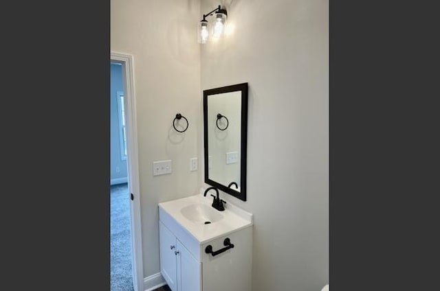 500 Peachers Mill Rd Unit C2, Clarksville, TN 37042 - bathroom with baseboards and vanity