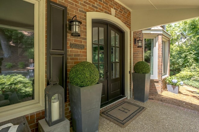716 Split Rail Dr, Brentwood, TN 37027 - entrance to property with brick siding, french doors, and a porch